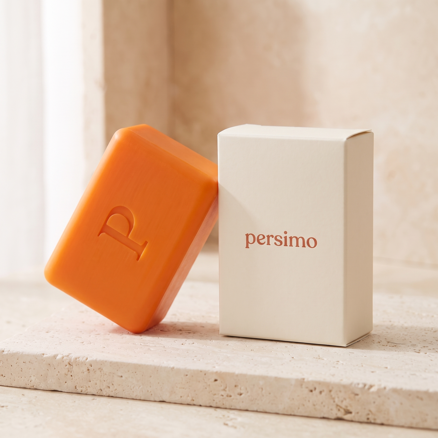 Persimo cream carton beside the orange soap bar