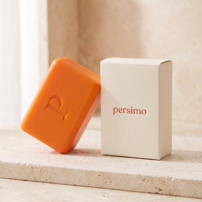 Persimo cream carton beside the orange soap bar